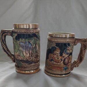 Lot of 2 Vintage Beer Steins. Large stein is a Quebec Canada souvenir motif